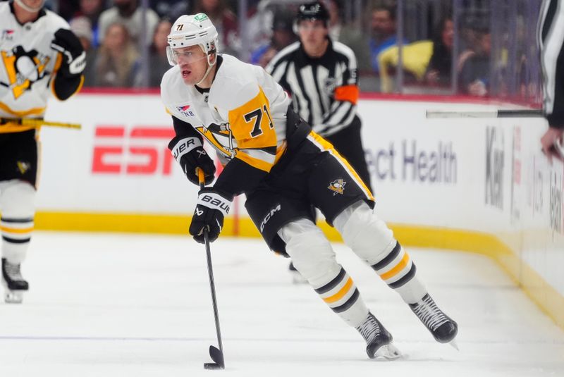 Mar 16, 2026; Denver, Colorado, USA; Pittsburgh Penguins center Evgeni Malkin (71) controls the puck during the first period against the Colorado Avalanche at Ball Arena. Mandatory Credit: Ron Chenoy-Imagn Images