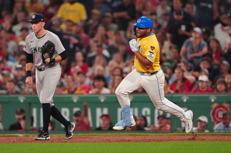 Jul 27, 2024; Boston, Massachusetts, USA; Boston Red Sox first baseman Dominic Smith (2) runs out a double against the New York Yankees during the seventh inning at Fenway Park. Mandatory Credit: Gregory Fisher-USA TODAY Sports