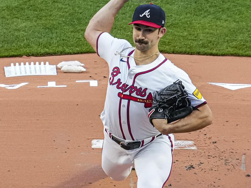 Apr 5, 2024; Cumberland, Georgia, USA; Atlanta Braves pitcher Spencer Strider (99) pitches against the Arizona Diamondbacks during the first inning at Truist Park. Mandatory Credit: Dale Zanine-USA TODAY Sports