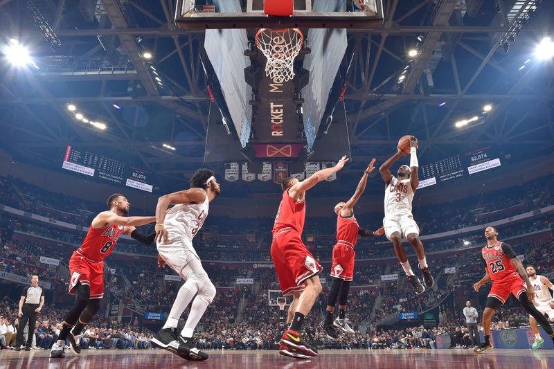 CLEVELAND, OH - JANUARY 15: Caris LeVert #3 of the Cleveland Cavaliers shoots the ball during the game against the Chicago Bulls on January 15, 2024 at Rocket Mortgage FieldHouse in Cleveland, Ohio. NOTE TO USER: User expressly acknowledges and agrees that, by downloading and/or using this Photograph, user is consenting to the terms and conditions of the Getty Images License Agreement. Mandatory Copyright Notice: Copyright 2024 NBAE (Photo by David Liam Kyle/NBAE via Getty Images)