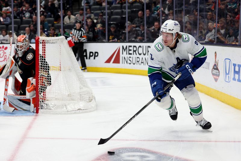 Mar 3, 2024; Anaheim, California, USA; Vancouver Canucks right wing Brock Boeser (6) skates with the puck during the third period against the Anaheim Ducks at Honda Center. Mandatory Credit: Jason Parkhurst-USA TODAY Sports