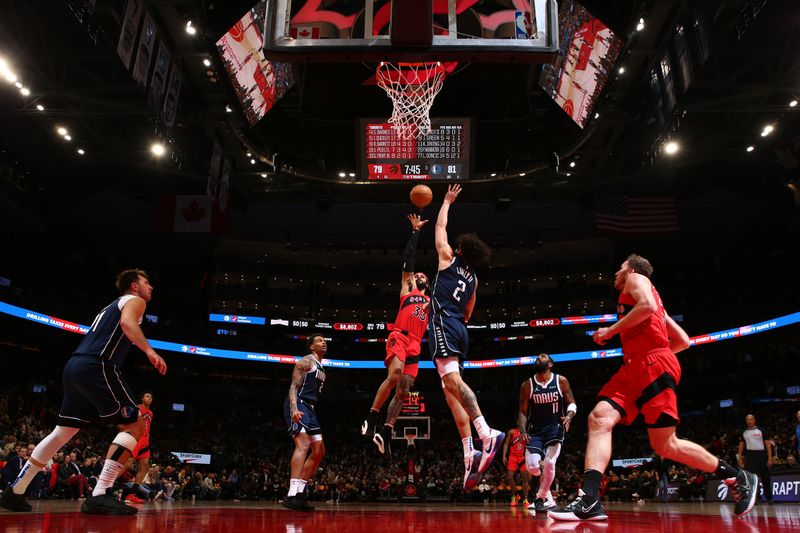 TORONTO, CANADA - FEBRUARY 28: Gary Trent Jr. #33 of the Toronto Raptors shoots the ball during the game against the Dallas Mavericks on February 28, 2024 at the Scotiabank Arena in Toronto, Ontario, Canada.  NOTE TO USER: User expressly acknowledges and agrees that, by downloading and or using this Photograph, user is consenting to the terms and conditions of the Getty Images License Agreement.  Mandatory Copyright Notice: Copyright 2024 NBAE (Photo by Vaughn Ridley/NBAE via Getty Images)