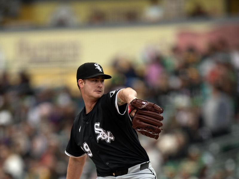 Apr 27, 2025; West Sacramento, California, USA; Chicago White Sox pitcher Jordan Leasure (49) delivers a pitch against the Athletics during the tenth inning at Sutter Health Park. Mandatory Credit: D. Ross Cameron-Imagn Images