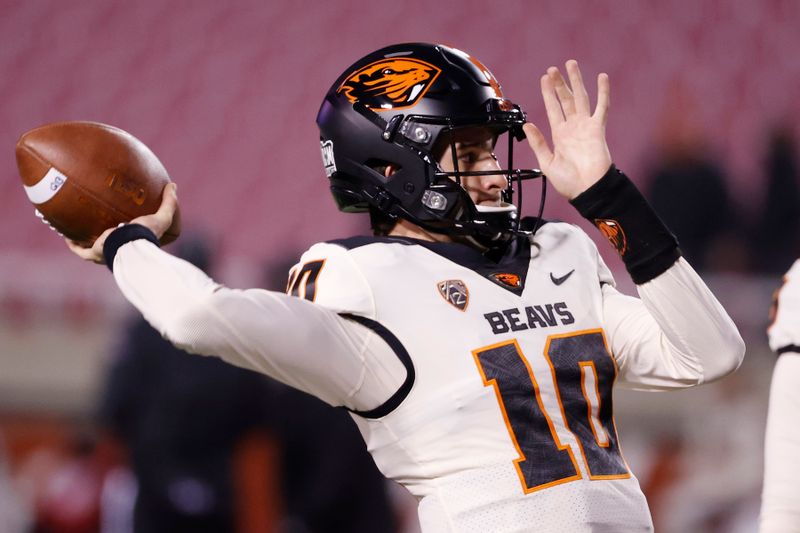 Dec 5, 2020; Salt Lake City, Utah, USA; Oregon State Beavers quarterback Chance Nolan (10) warms up prior to their game against the Utah Utes at Rice-Eccles Stadium. Mandatory Credit: Jeffrey Swinger-USA TODAY Sports