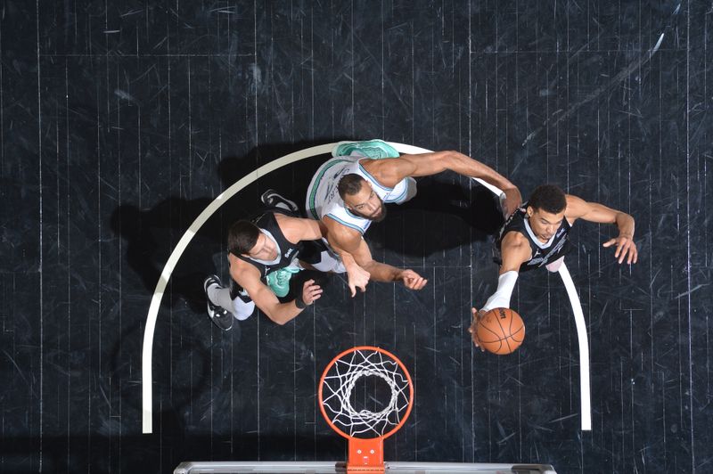 SAN ANTONIO, TX - JANUARY 27: Victor Wembanyama #1 of the San Antonio Spurs rebounds the ball during the game against the Minnesota Timberwolves on January 27, 2024 at the Frost Bank Center in San Antonio, Texas. NOTE TO USER: User expressly acknowledges and agrees that, by downloading and or using this photograph, user is consenting to the terms and conditions of the Getty Images License Agreement. Mandatory Copyright Notice: Copyright 2024 NBAE (Photos by Michael Gonzales/NBAE via Getty Images)