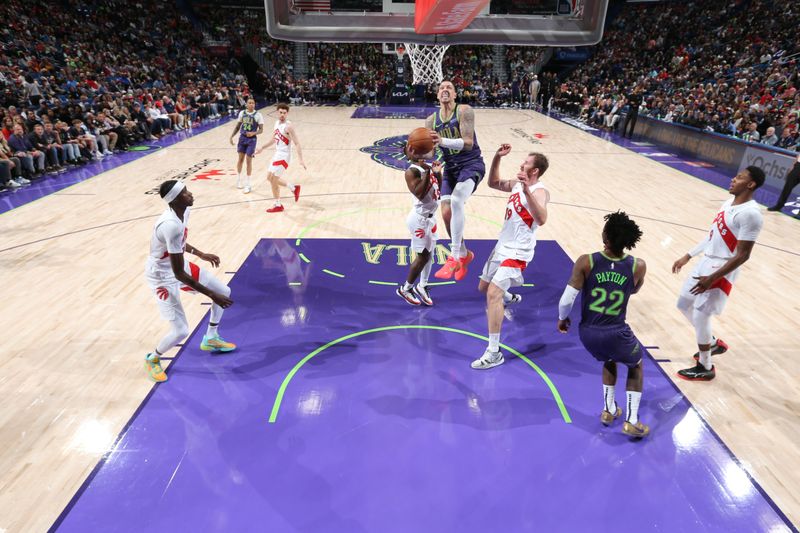 NEW ORLEANS, LA - NOVEMBER 27:  Daniel Theis #10 of the New Orleans Pelicans shoots the ball during the game against the Toronto Raptors during a regular season game on November 27, 2024 at the Smoothie King Center in New Orleans, Louisiana. NOTE TO USER: User expressly acknowledges and agrees that, by downloading and or using this Photograph, user is consenting to the terms and conditions of the Getty Images License Agreement. Mandatory Copyright Notice: Copyright 2024 NBAE (Photo by Layne Murdoch Jr./NBAE via Getty Images)