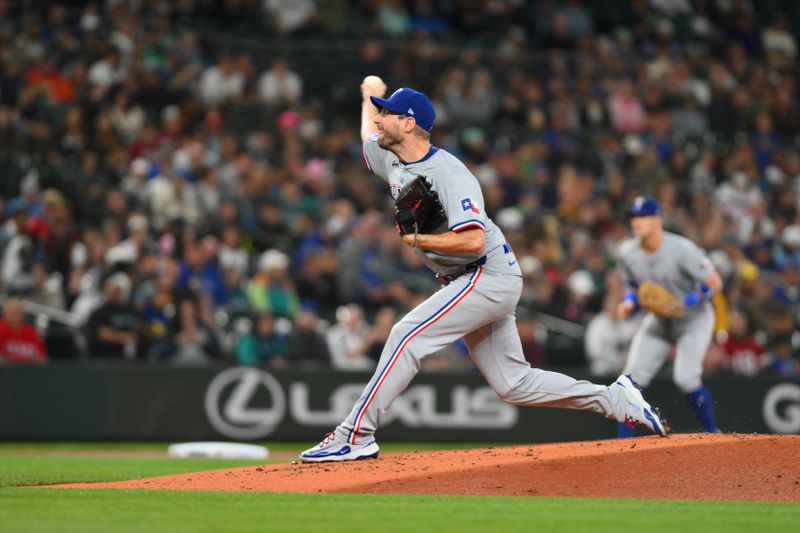 Sep 14, 2024; Seattle, Washington, USA; Texas Rangers starting pitcher Max Scherzer (31) pitches to the Seattle Mariners during the first inning at T-Mobile Park. Mandatory Credit: Steven Bisig-Imagn Images