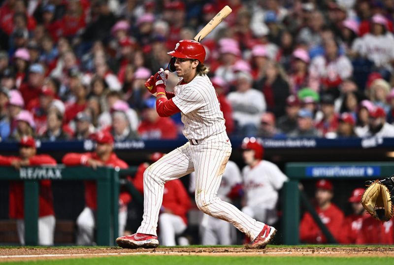 May 5, 2024; Philadelphia, Pennsylvania, USA; Philadelphia Phillies second baseman Bryson Stott (5) hits a RBI double against the San Francisco Giants in the third inning at Citizens Bank Park. Mandatory Credit: Kyle Ross-USA TODAY Sports