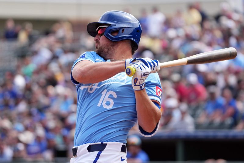 Mar 23, 2024; Surprise, Arizona, USA; Kansas City Royals right fielder Hunter Renfroe (16) bats against the Texas Rangers during the first inning at Surprise Stadium. Mandatory Credit: Joe Camporeale-USA TODAY Sports