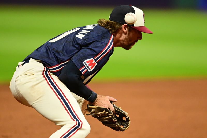 Aug 23, 2024; Cleveland, Ohio, USA; Cleveland Guardians third baseman Daniel Schneemann (10) makes an error on a hit by Texas Rangers third baseman Josh Jung (not pictured) during the sixth inning at Progressive Field. Mandatory Credit: Ken Blaze-USA TODAY Sports