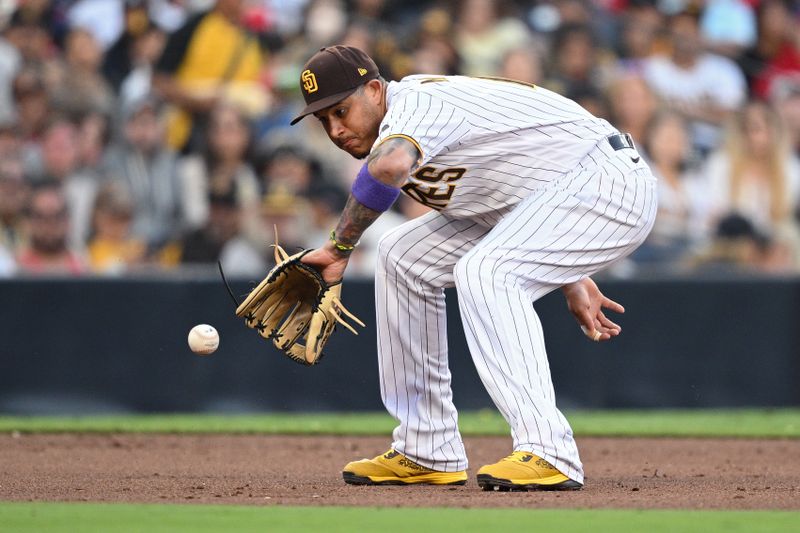 Jul 5, 2023; San Diego, California, USA; San Diego Padres third baseman Manny Machado (13) fields a ground ball hit by Los Angeles Angels right fielder Hunter Renfroe (not pictured) during the sixth inning at Petco Park. Mandatory Credit: Orlando Ramirez-USA TODAY Sports