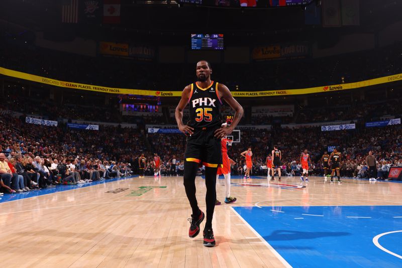 OKLAHOMA CITY, OK - MARCH 29:  Kevin Durant #35 of the Phoenix Suns looks on during the game against the Oklahoma City Thunder on March 29, 2024 at Paycom Arena in Oklahoma City, Oklahoma. NOTE TO USER: User expressly acknowledges and agrees that, by downloading and or using this photograph, User is consenting to the terms and conditions of the Getty Images License Agreement. Mandatory Copyright Notice: Copyright 2024 NBAE (Photo by Zach Beeker/NBAE via Getty Images)