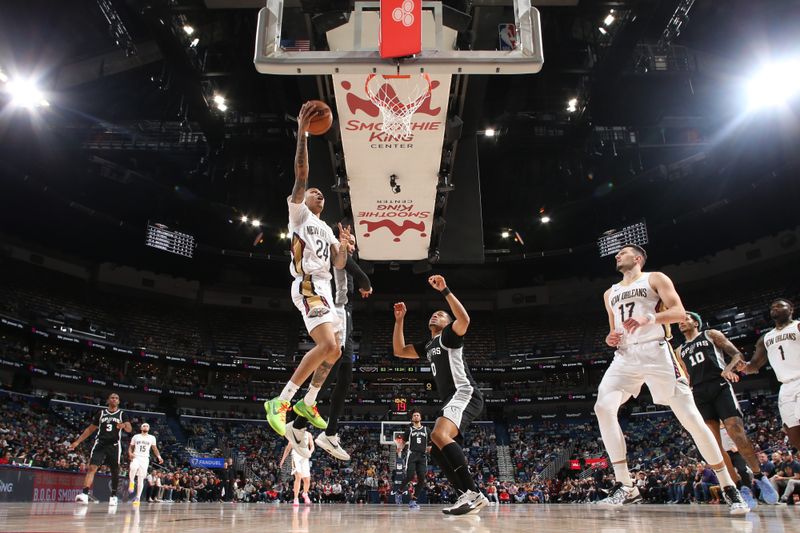 NEW ORLEANS, LA - FEBRUARY 25: Jordan Hawkins #24 of the New Orleans Pelicans shoots the ball during the game against the San Antonio Spurs on February 25, 2025 at the Smoothie King Center in New Orleans, Louisiana. NOTE TO USER: User expressly acknowledges and agrees that, by downloading and or using this Photograph, user is consenting to the terms and conditions of the Getty Images License Agreement. Mandatory Copyright Notice: Copyright 2025 NBAE (Photo by Layne Murdoch Jr./NBAE via Getty Images)