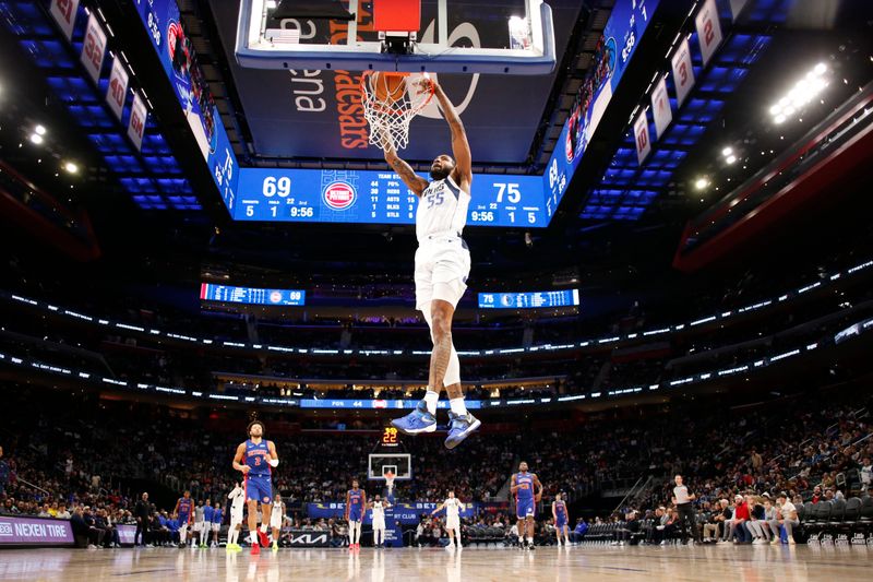 DETROIT, MI - MARCH 9: Derrick Jones Jr. #55 of the Dallas Mavericks dunks the ball during the game against the Detroit Pistons on March 9, 2024 at Little Caesars Arena in Detroit, Michigan. NOTE TO USER: User expressly acknowledges and agrees that, by downloading and/or using this photograph, User is consenting to the terms and conditions of the Getty Images License Agreement. Mandatory Copyright Notice: Copyright 2024 NBAE (Photo by Brian Sevald/NBAE via Getty Images)