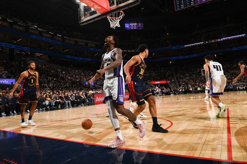 SAN FRANCISCO, CA - JANUARY 5:  Malik Monk #0 of the Sacramento Kings celebrates during the game against the Golden State Warriors on January 5, 2025 at Chase Center in San Francisco, California. NOTE TO USER: User expressly acknowledges and agrees that, by downloading and or using this photograph, user is consenting to the terms and conditions of Getty Images License Agreement. Mandatory Copyright Notice: Copyright 2025 NBAE (Photo by Noah Graham/NBAE via Getty Images)