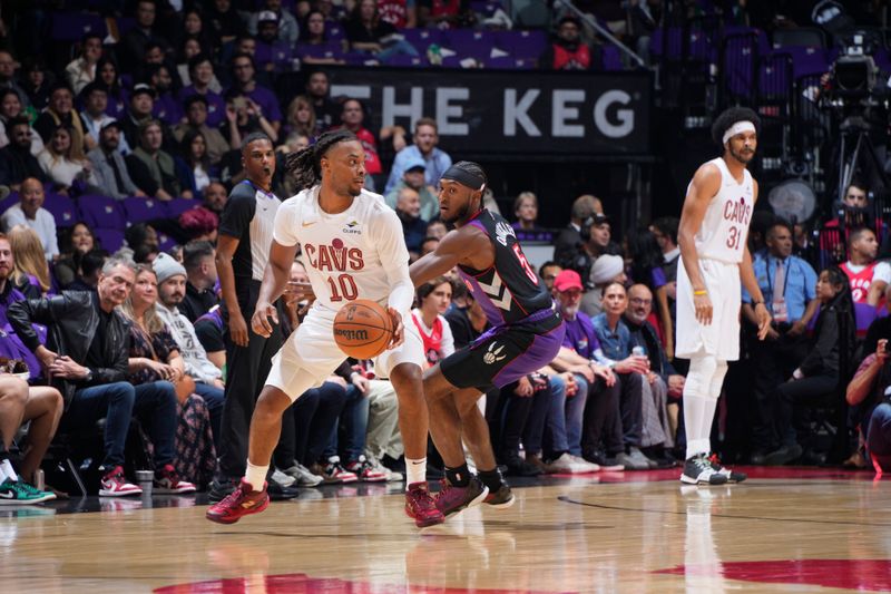 TORONTO, CANADA - OCTOBER 23: Darius Garland #10 of the Cleveland Cavaliers dribbles the ball during the game against the Toronto Raptors on October 23, 2024 at the Scotiabank Arena in Toronto, Ontario, Canada.  NOTE TO USER: User expressly acknowledges and agrees that, by downloading and or using this Photograph, user is consenting to the terms and conditions of the Getty Images License Agreement.  Mandatory Copyright Notice: Copyright 2024 NBAE (Photo by Mark Blinch/NBAE via Getty Images)