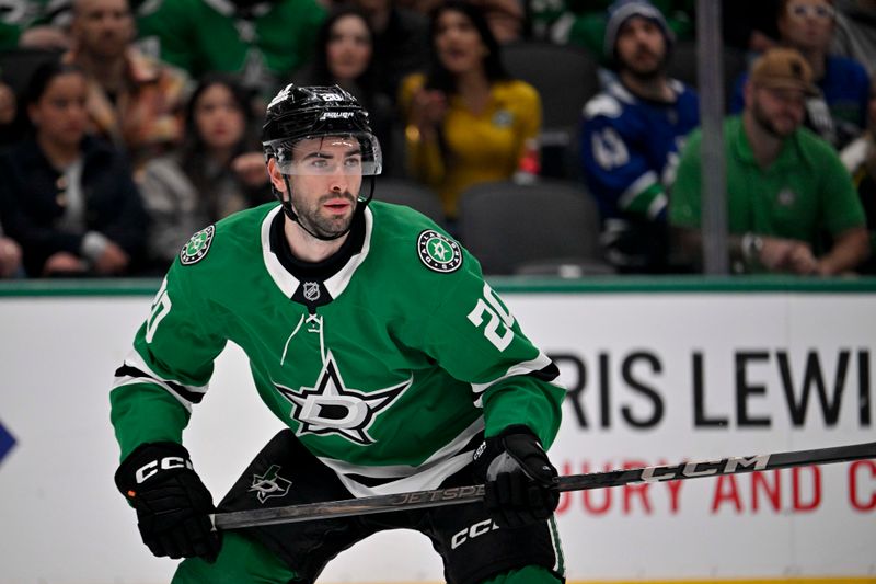 Jan 31, 2025; Dallas, Texas, USA; Dallas Stars defenseman Kyle Capobianco (20) skates against the Vancouver Canucks during the first period at the American Airlines Center. Mandatory Credit: Jerome Miron-Imagn Images