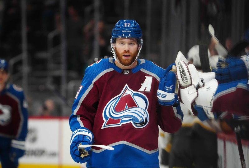 Sep 25, 2022; Denver, Colorado, USA; Colorado Avalanche left wing J.T. Compher (37) celebrates a goal in the third period against the Vegas Golden Knights at Ball Arena. Mandatory Credit: Ron Chenoy-USA TODAY Sports