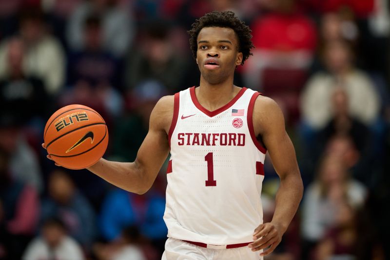 Dec 30, 2025; Stanford, California, USA; Stanford Cardinal guard Ebuka Okorie (1) brings the ball upcourt against the Notre Dame Fighting Irish during the second half at Maples Pavilion. Mandatory Credit: Robert Edwards-Imagn Images