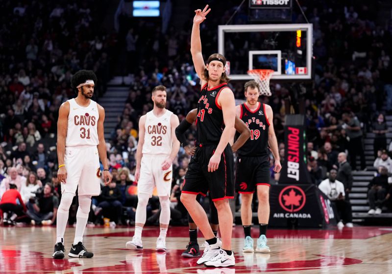 TORONTO, ON - FEBRUARY 10: Kelly Olynyk #41 of the Toronto Raptors checks into the game against the Cleveland Cavaliers during the first half of their basketball game at the Scotiabank Arena on February 10, 2024 in Toronto, Ontario, Canada. NOTE TO USER: User expressly acknowledges and agrees that, by downloading and/or using this Photograph, user is consenting to the terms and conditions of the Getty Images License Agreement. (Photo by Mark Blinch/Getty Images)