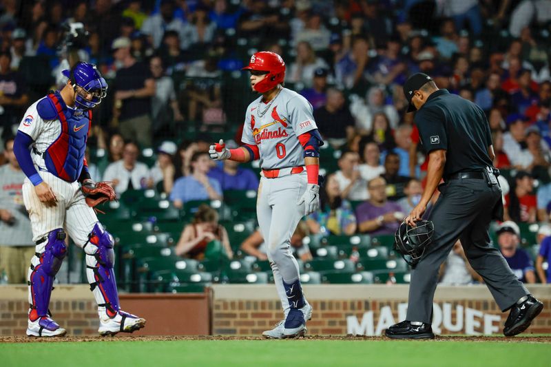 Aug 1, 2024; Chicago, Illinois, USA; St. Louis Cardinals shortstop Masyn Winn (0) crosses home plate after hitting a two-run home run against the Chicago Cubs during the seventh inning at Wrigley Field. Mandatory Credit: Kamil Krzaczynski-USA TODAY Sports