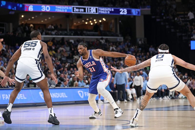 MEMPHIS, TENNESSEE - APRIL 06: Joel Embiid #21 of the Philadelphia 76ers goes to the basket during the first half against Trey Jemison #55 of the Memphis Grizzlies at FedExForum on April 06, 2024 in Memphis, Tennessee. NOTE TO USER: User expressly acknowledges and agrees that, by downloading and or using this photograph, User is consenting to the terms and conditions of the Getty Images License Agreement. (Photo by Justin Ford/Getty Images)