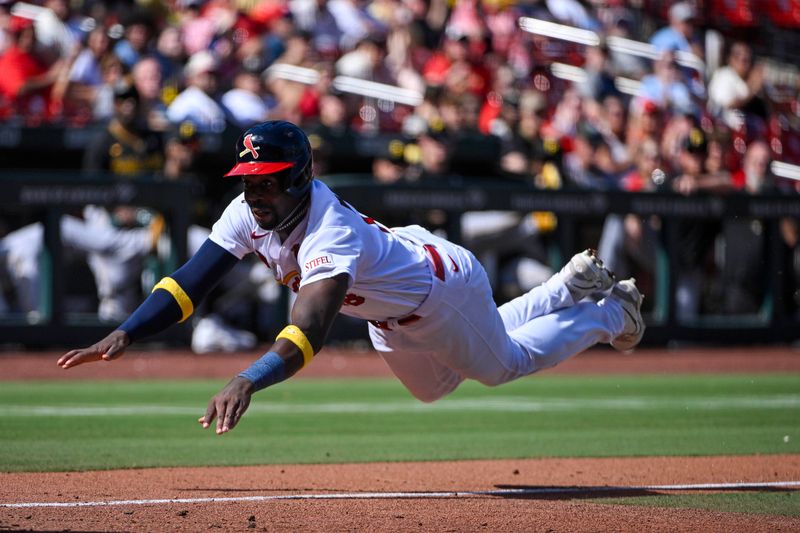 Sep 3, 2023; St. Louis, Missouri, USA;  St. Louis Cardinals right fielder Jordan Walker (18) dives as he slides head first in at home plate against the Pittsburgh Pirates during the seventh inning at Busch Stadium. Mandatory Credit: Jeff Curry-USA TODAY Sports