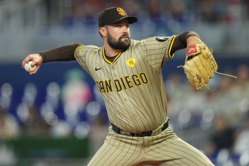 Aug 10, 2024; Miami, Florida, USA;  San Diego Padres starting pitcher Matt Waldron (61) pitches against the Miami Marlins in the first inning at loanDepot Park. Mandatory Credit: Jim Rassol-USA TODAY Sports