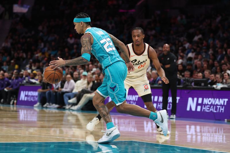 CHARLOTTE, NC -NOVEMBER 21:  Tre Mann #23 of the Charlotte Hornets dribbles the ball during the game against the Detroit Pistons on November 21, 2024 at Spectrum Center in Charlotte, North Carolina. NOTE TO USER: User expressly acknowledges and agrees that, by downloading and or using this photograph, User is consenting to the terms and conditions of the Getty Images License Agreement. Mandatory Copyright Notice: Copyright 2024 NBAE (Photo by Brock Williams-Smith/NBAE via Getty Images)