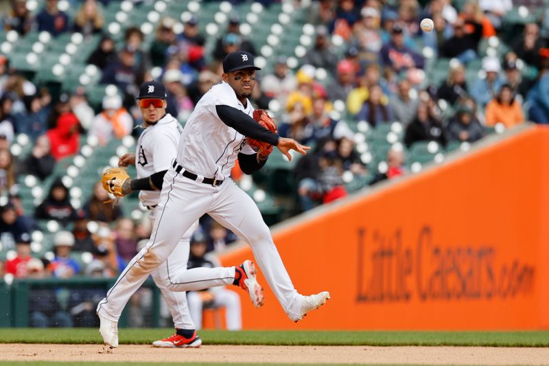 Apr 30, 2023; Detroit, Michigan, USA; Detroit Tigers third baseman Andy Ibanez (77) makes a throw in the eighth inning against the Baltimore Orioles at Comerica Park. Mandatory Credit: Rick Osentoski-USA TODAY Sports
