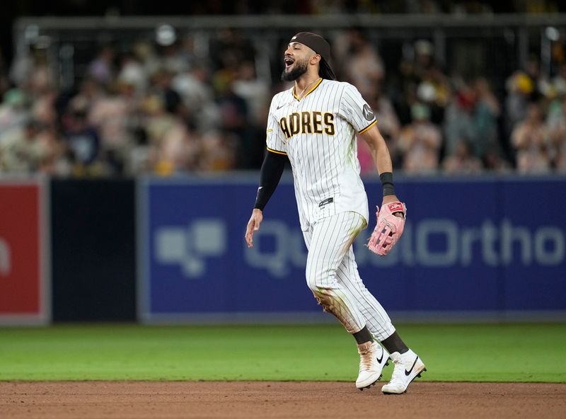 Jun 14, 2023; San Diego, California, USA;  San Diego Padres right fielder Fernando Tatis Jr. (23) celebrates after defeating the Cleveland Guardians at Petco Park. Mandatory Credit: Ray Acevedo-USA TODAY Sports