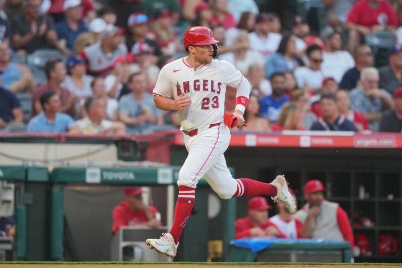 Jul 10, 2024; Anaheim, California, USA; Los Angeles Angels second baseman Brandon Drury (23) scores in the third inning against the Texas Rangers at Angel Stadium. Mandatory Credit: Kirby Lee-USA TODAY Sports