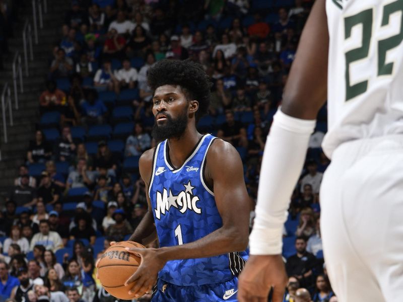 ORLANDO, FL - APRIL 14:  Jonathan Isaac #1 of the Orlando Magic handles the ball during the game again the Milwaukee Bucks on April 14, 2024 at Kia Center in Orlando, Florida. NOTE TO USER: User expressly acknowledges and agrees that, by downloading and or using this photograph, User is consenting to the terms and conditions of the Getty Images License Agreement. Mandatory Copyright Notice: Copyright 2024 NBAE (Photo by Fernando Medina/NBAE via Getty Images)