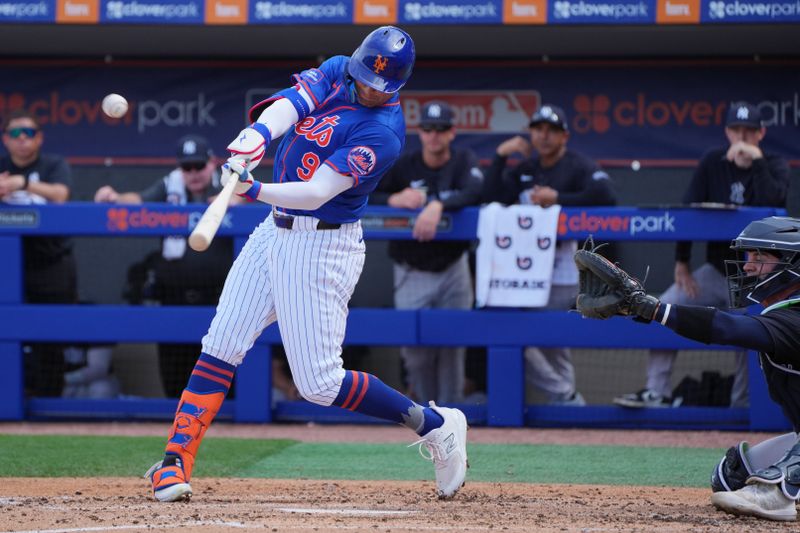 Mar 5, 2024; Port St. Lucie, Florida, USA;  New York Mets center fielder Brandon Nimmo (9) hits a double in the third inning against the New York Yankees at Clover Park. Mandatory Credit: Jim Rassol-USA TODAY Sports