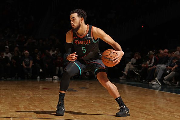 WASHINGTON, DC -? DECEMBER 15:  Tyus Jones #5 of the Washington Wizards handles the ball during the game against the Indiana Pacers on December 15, 2023 at Capital One Arena in Washington, DC. NOTE TO USER: User expressly acknowledges and agrees that, by downloading and or using this Photograph, user is consenting to the terms and conditions of the Getty Images License Agreement. Mandatory Copyright Notice: Copyright 2023 NBAE (Photo by Stephen Gosling/NBAE via Getty Images)