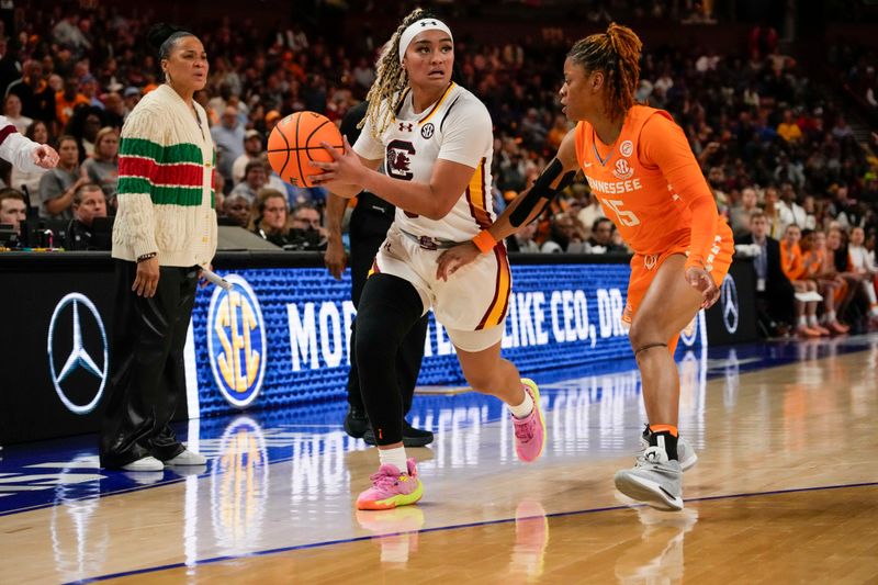 Mar 9, 2024; Greensville, SC, USA; South Carolina Gamecocks guard Te-Hina Paopao (0) dribbles against Tennessee Lady Vols guard Jasmine Powell (15) during the second half at Bon Secours Wellness Arena. Mandatory Credit: Jim Dedmon-USA TODAY Sports