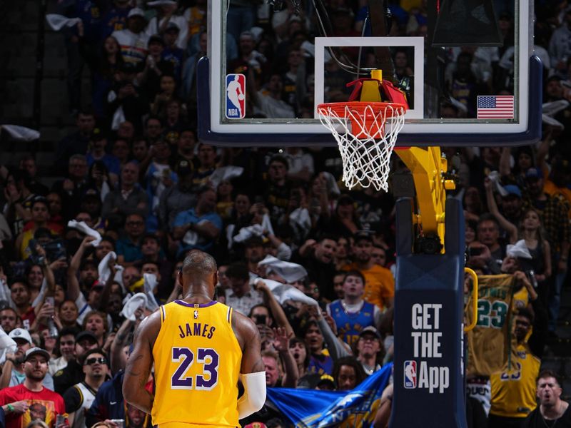 DENVER, CO - APRRIL 22: LeBron James #23 of the Los Angeles Lakers shoots a free throw during the game against the Denver Nuggets during Round 1 Game 2 of the 2024 NBA Playoffs on April 22, 2024 at the Ball Arena in Denver, Colorado. NOTE TO USER: User expressly acknowledges and agrees that, by downloading and/or using this Photograph, user is consenting to the terms and conditions of the Getty Images License Agreement. Mandatory Copyright Notice: Copyright 2024 NBAE (Photo by Garrett Ellwood/NBAE via Getty Images)