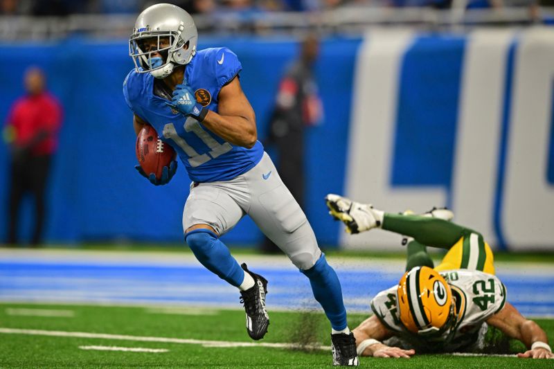 Detroit Lions wide receiver Kalif Raymond returns a missed field goal during the first half of an NFL football game against the Green Bay Packers, Thursday, Nov. 23, 2023, in Detroit. The Packers won 29-22. (AP Photo/David Dermer)