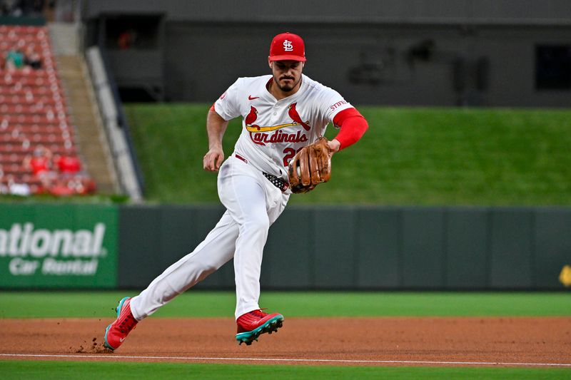 Sep 16, 2024; St. Louis, Missouri, USA;  St. Louis Cardinals third baseman Nolan Arenado (28) fields a ground ball against the Pittsburgh Pirates during the first inning at Busch Stadium. Mandatory Credit: Jeff Curry-Imagn Images