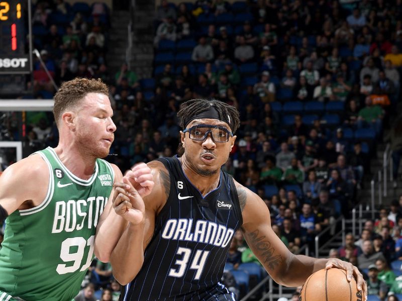 ORLANDO, FL - JANUARY 23: Wendell Carter Jr. #34 of the Orlando Magic drives to the basket during the game against the Boston Celtics on January 23, 2023 at Amway Center in Orlando, Florida. NOTE TO USER: User expressly acknowledges and agrees that, by downloading and or using this photograph, User is consenting to the terms and conditions of the Getty Images License Agreement. Mandatory Copyright Notice: Copyright 2023 NBAE (Photo by Fernando Medina/NBAE via Getty Images)