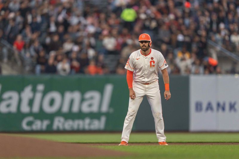 Aug 20, 2024; San Francisco, California, USA;  San Francisco Giants catcher Curt Casali (2) takes the lead off of second during the third inning against the Chicago White Sox at Oracle Park. Mandatory Credit: Stan Szeto-USA TODAY Sports