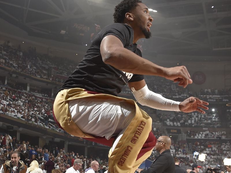 CLEVELAND, OH - APRIL 20: Donovan Mitchell #45 of the Cleveland Cavaliers warms up during Round 1 Game 1 of the 2024 NBA Playoffs against the Orlando Magic on April 20, 2024 at Rocket Mortgage FieldHouse in Cleveland, Ohio. NOTE TO USER: User expressly acknowledges and agrees that, by downloading and/or using this Photograph, user is consenting to the terms and conditions of the Getty Images License Agreement. Mandatory Copyright Notice: Copyright 2024 NBAE (Photo by David Liam Kyle/NBAE via Getty Images)