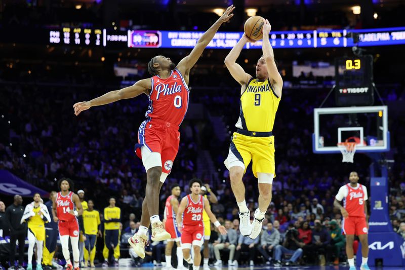 PHILADELPHIA, PENNSYLVANIA - DECEMBER 13: T.J. McConnell #9 of the Indiana Pacers puts up a shot against Tyrese Maxey #0 of the Philadelphia 76ers during the first half at the Wells Fargo Center on December 13, 2024 in Philadelphia, Pennsylvania. NOTE TO USER: User expressly acknowledges and agrees that, by downloading and or using this photograph, User is consenting to the terms and conditions of the Getty Images License Agreement. (Photo by Emilee Chinn/Getty Images)