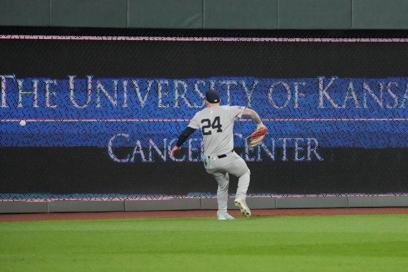 Oct 10, 2024; Kansas City, Missouri, USA; New York Yankees outfielder Alex Verdugo (24) chases down an outfield fly during the sixth inning against the Kansas City Royals during game four of the ALDS for the 2024 MLB Playoffs at Kauffman Stadium. Mandatory Credit: Denny Medley-Imagn Images