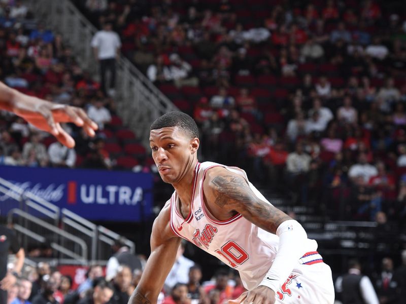 HOUSTON, TX - APRIL 5: Jabari Smith Jr. #10 of the Houston Rockets dribbles the ball during the game against the Miami Heat on April 5, 2024 at the Toyota Center in Houston, Texas. NOTE TO USER: User expressly acknowledges and agrees that, by downloading and or using this photograph, User is consenting to the terms and conditions of the Getty Images License Agreement. Mandatory Copyright Notice: Copyright 2024 NBAE (Photo by Logan Riely/NBAE via Getty Images)