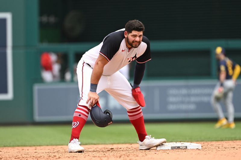 Aug 4, 2024; Washington, District of Columbia, USA; Washington Nationals first baseman Juan Yepez (18) rests on second base during a pitching change against the Milwaukee Brewers during the sixth inning at Nationals Park. Mandatory Credit: Rafael Suanes-USA TODAY Sports