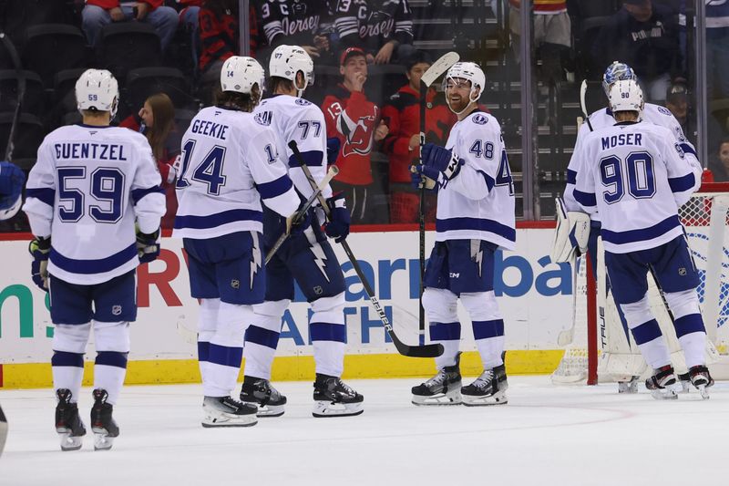 Oct 22, 2024; Newark, New Jersey, USA; The Tampa Bay Lightning celebrate their win over the New Jersey Devils at Prudential Center. Mandatory Credit: Ed Mulholland-Imagn Images