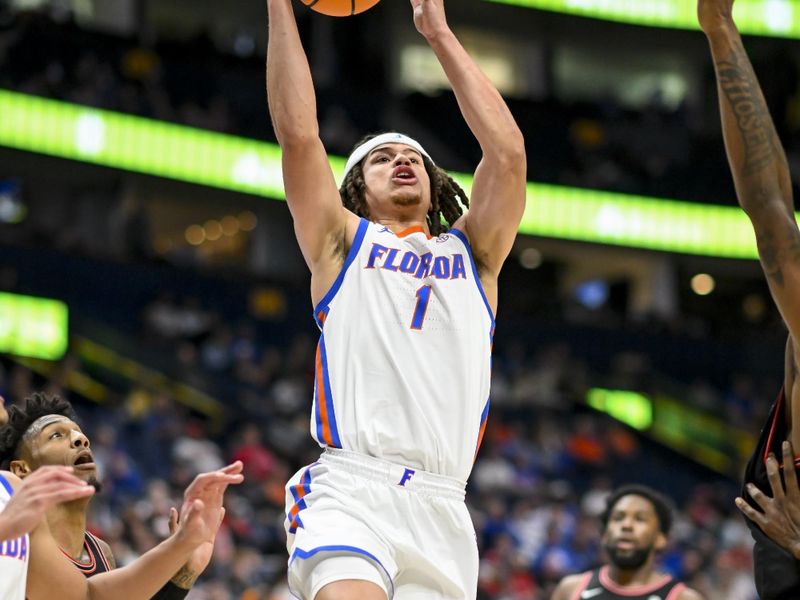 Mar 14, 2024; Nashville, TN, USA;  Florida Gators guard Walter Clayton Jr. (1) shoots against the Georgia Bulldogs during the second half at Bridgestone Arena. Mandatory Credit: Steve Roberts-USA TODAY Sports