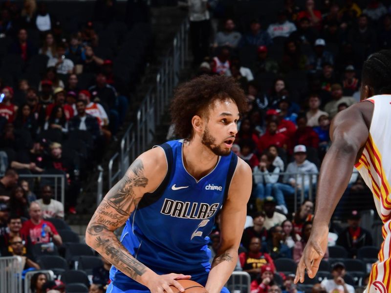 ATLANTA, GA - JANUARY 26: Dereck Lively II #2 of the Dallas Mavericks looks to pass the ball during the game against the Atlanta Hawks on January 26, 2024 at State Farm Arena in Atlanta, Georgia.  NOTE TO USER: User expressly acknowledges and agrees that, by downloading and/or using this Photograph, user is consenting to the terms and conditions of the Getty Images License Agreement. Mandatory Copyright Notice: Copyright 2024 NBAE (Photo by Scott Cunningham/NBAE via Getty Images)