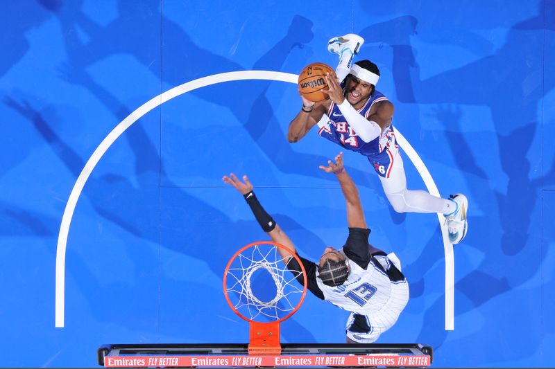 ORLANDO, FL - OCTOBER 18: Ricky Council IV #14 of the Philadelphia 76ers shoots the ball during the game against the Orlando Magic during a NBA preseason game on October 18, 2024 at Kia Center in Orlando, Florida. NOTE TO USER: User expressly acknowledges and agrees that, by downloading and or using this photograph, User is consenting to the terms and conditions of the Getty Images License Agreement. Mandatory Copyright Notice: Copyright 2024 NBAE (Photo by Fernando Medina/NBAE via Getty Images)